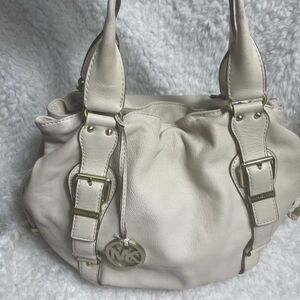 Michael Kors leather beige hobo bag gold tone hardwares & accents drawstring